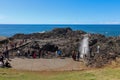 People at the Kiama Blowhole on a bright sunny day