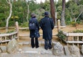 People at the Kinkaku temple in Kyoto, Japan