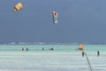 People and kite surfers