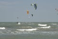 People kite surfing at beach