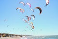 People kiteboarding