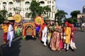 The people of Kolkata celebrating with colorful traditional dress in the ity street. Royalty Free Stock Photo