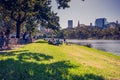 People lay down on the bank of Yarra River. 4PM, 25 February, 2017 Royalty Free Stock Photo