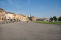 People are walking through the main square of Prato della Valle in Padua, Italy