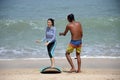 People learning surfing on the Balinese beach