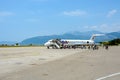 People leave the plane after landing at the airport