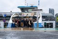 People leaving a GVB ferryboat in Amsterdam