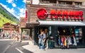 People leaving Mammut 1862 store a Swiss mountain sports clothing and equipment shop in Zermatt Switzerland Royalty Free Stock Photo