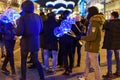 People with LED lighting balloons to sell on Nevsky Prospect on New Year`s night. Saint Petersburg. Russia Royalty Free Stock Photo