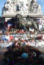 People left memorial items around the statue of Palace de la Republique