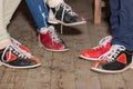 People legs with bowling shoes standing on old wooden floor Royalty Free Stock Photo