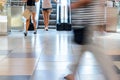 People on escalator motion blurred