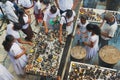 People light candles at the Buddhist temple during Vesak religious celebration in Colombo, Sri Lanka. Royalty Free Stock Photo