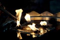 People light incense joss sticks at the temple Royalty Free Stock Photo