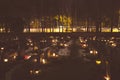 People lighting candles in the Kalevankangas cemetery in Tampere