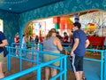 People in line social distancing for Slinky Dog Dash roller coaster ride