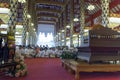 People listen to monk preachment in buddhism church temple