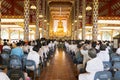 People listen to monk preachment in buddhism church temple