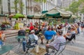 People listen to an outdoor concert in Bryant Park, New York