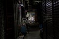 People live their normal lives in narrow alley at Khaosan road