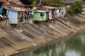 People living in poverty along the canals of Manila Philippines Royalty Free Stock Photo