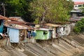 People living in poverty along the canals of Manila Philippines Royalty Free Stock Photo