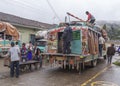 People load merchandise on a bus, Silvia, Cauca Valley, Colombia