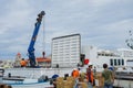 People loading goods on the Nanhai Star vessel