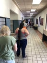 People in a long line at the US Post office waiting to be served Royalty Free Stock Photo