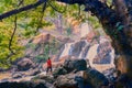 People are looking at beautiful waterfalls in nature