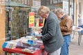 People looking through books outside a book store Royalty Free Stock Photo