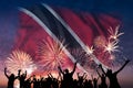 People are looking on fireworks and flag of Trinidad and Tobago Royalty Free Stock Photo