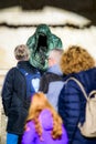 People looking at the PietÃÂ¡ statue by Anna Chromy at the Salzburg Cathedral