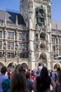 People looking at the Rathaus-Glockenspiel Munich during the display at the Town Hall, Germany
