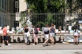 People looking at second hand books for sale on flea market in front of the Humboldt University in Berlin Royalty Free Stock Photo