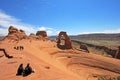 People looking toward Delicate Arch at Arches National Park, Utah