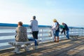 People looking at the view on San Clemente Pier. Royalty Free Stock Photo