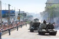 People looks on weaponry and tank on road Royalty Free Stock Photo