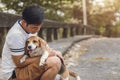 People love and care his pet dog. old Beagle dog stay with man