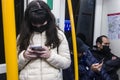 People on Madrid Transport System Metro wearing Covid masks, Madrid Spain