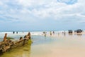 People at the Maheno shipwreck on 75 mile beach, one of the most popular landmarks on Fraser Island, Fraser Coast, Queensland, Aus Royalty Free Stock Photo