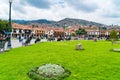 People at the Main Square Plaza de Armas with the Statue of Pachacuti and cityscape of Cusco in Peru Royalty Free Stock Photo