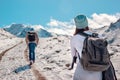 People make the ascent to the mountain top. Snow slope