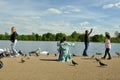 People taking selfies in Hyde Park , London , England