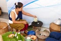 People making sweet and savory grilled coconut rice hotcake