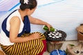 People making sweet and savory grilled coconut rice hotcake Royalty Free Stock Photo