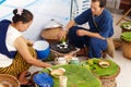 People making sweet and savory grilled coconut rice hotcake Royalty Free Stock Photo