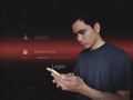 A people man Asia hacker used his phone to unlock a password to hack information. digital crime prevention by anonymous hackers.