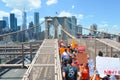 People marching across the Brooklyn Bridge in support of shooting survivors and anti-gun violence