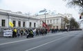 People marching along Grushevskogo street, holding broadsheets demanding legalization of medical marijuana. Cannabis Royalty Free Stock Photo